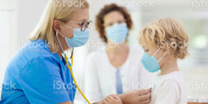 child and nurse exam